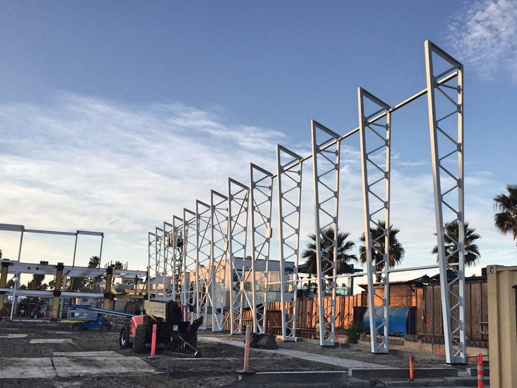 The Plunge Pool at Belmont Park, San Diego; new aluminum curved retractable roof enclosure shown under construction